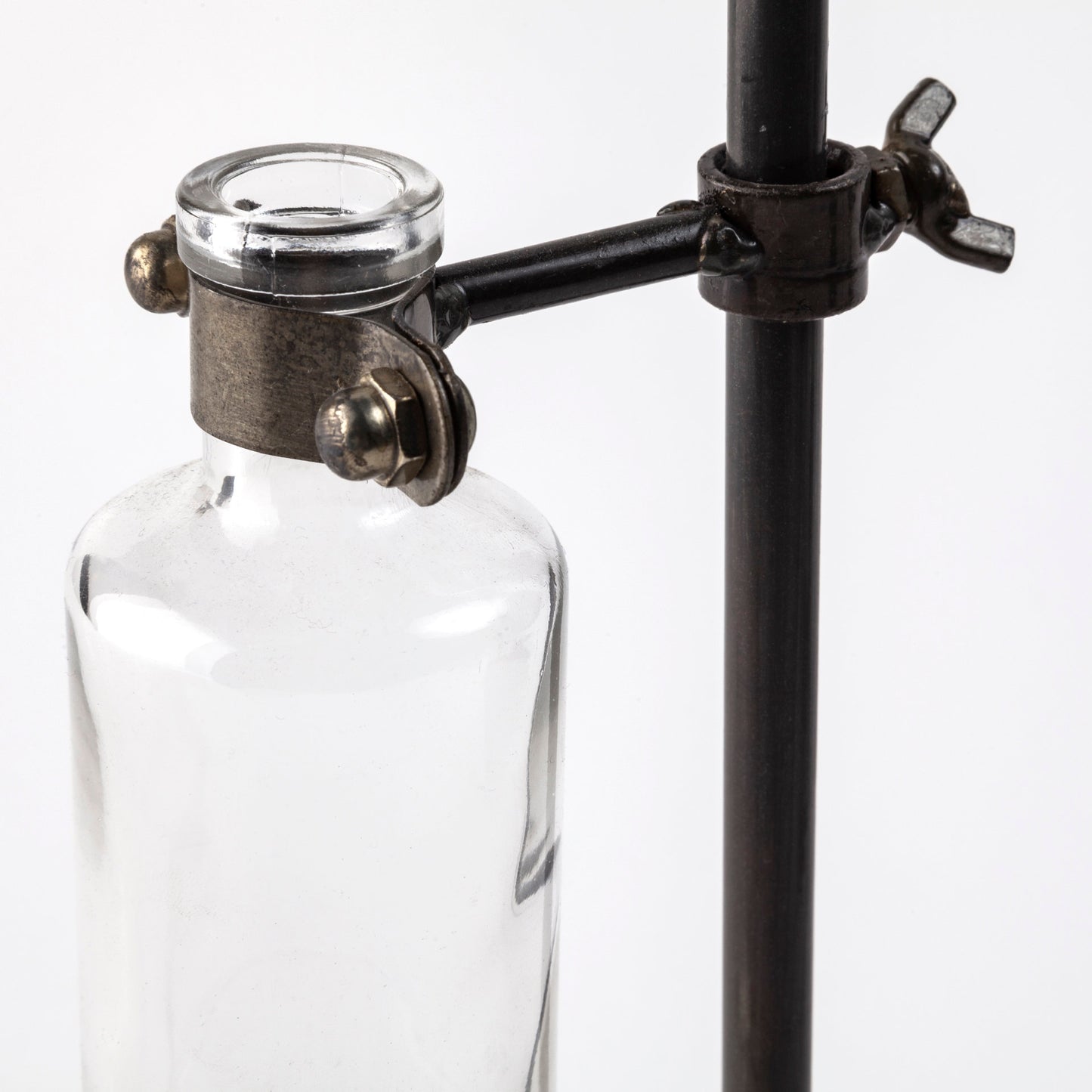 Jarvis Set of Five Dark Brown Metal and Glass Chemistry Inspired Bottles