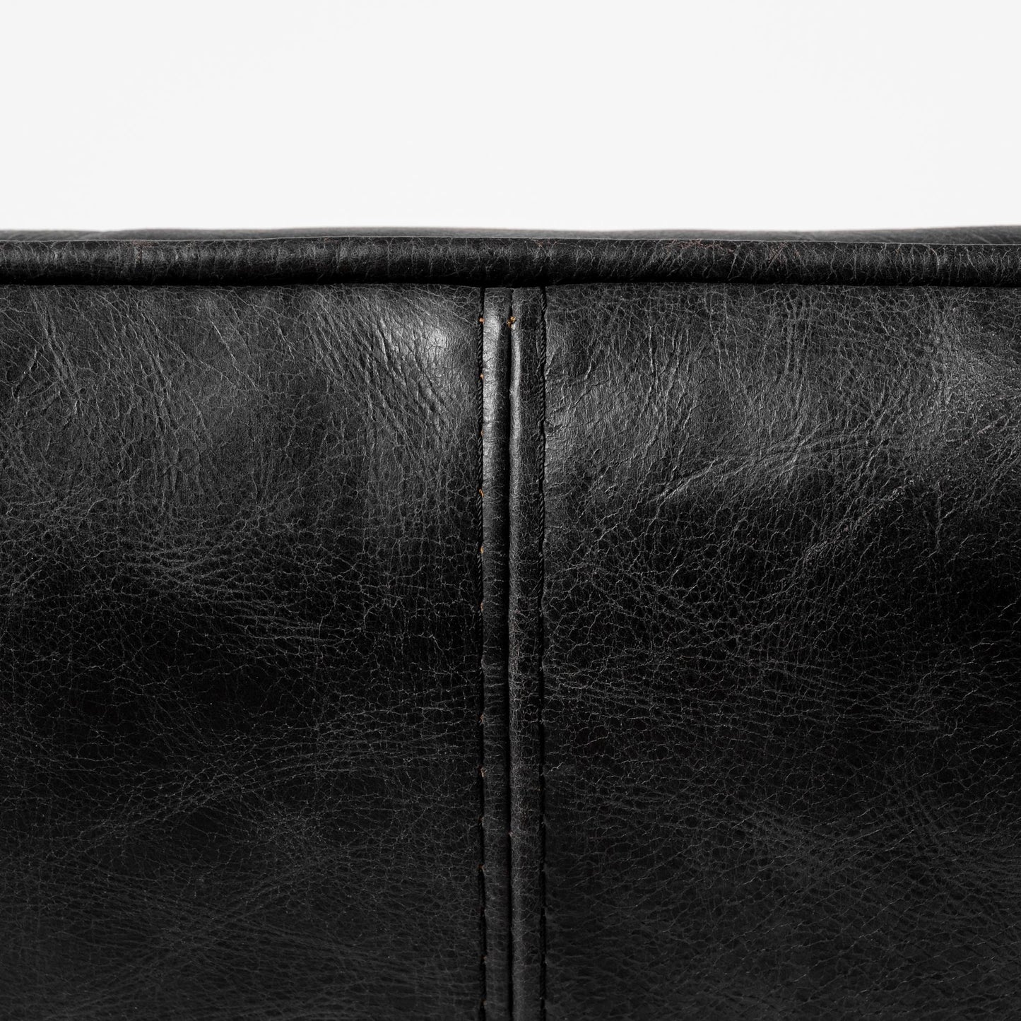 Flavelle II Black Leather Cushion Seat and Solid Iron Base Accent Chair