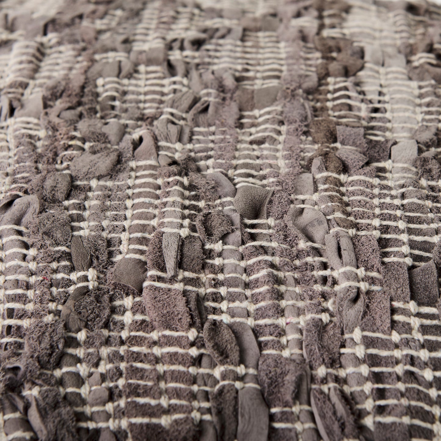 Falguni 16.0L x 16.0W x 16.0H Gray Leather and Cotton Patterned Pouf