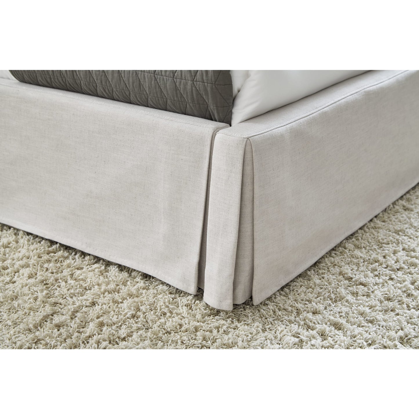 Hera Upholstered Skirted Panel Bed in Oatmeal